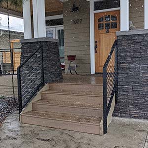 Porch metal railing with cable system